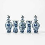 A Dutch Rococo Delft blue and white five-piece matched garnitureThe beaker vases and one baluster