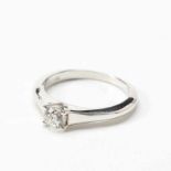 An 18 carat white gold and diamond single stone ring21st centuryCentered by a circular-cut diamond