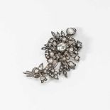 A 14 carat gold, silver and diamond flower broochThe Netherlands, circa 1900Shaped as a spray of