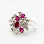 A 14 carat white gold, diamond and ruby ringCirca 1970Set with circular- and carré-cut diamonds