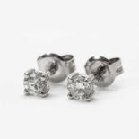 A pair of 18 carat white gold and diamond ear studs21st centuryEach set with a circular-cut