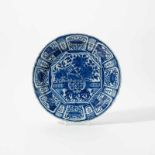 A Dutch Delft blue and white chinoiserie 'kraak porselein'-style chargerCirca 1700Decorated in the