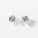 A pair of 18 carat white gold and diamond ear studs21st centuryThe circular-cut diamonds in plain