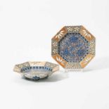 A pair of Japanese Imari octagonal dishes19th-20th centuryEach raised on four bracket feet, the