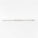 A 14 carat white gold and diamond line bracelet20th centuryDesigned as a graduating line of collet