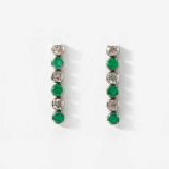 A pair of 14 carat white gold, diamond and emerald ear pendants21st centuryDesigned as a line of