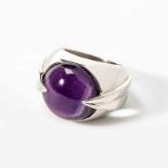 A silver and amethyst Kenzo ringLate 20th centuryCentered by a cabochon-cut amethyst to plain silver