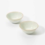 A pair of Chinese Qingbai bowlsSong dynasty (960-1279)The bowls each raised on a short cylindrical