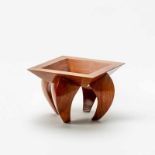 A wood base by Bořek Šípek1949–2016A square wood bowl on four horn-shaped wood feet, signed on the