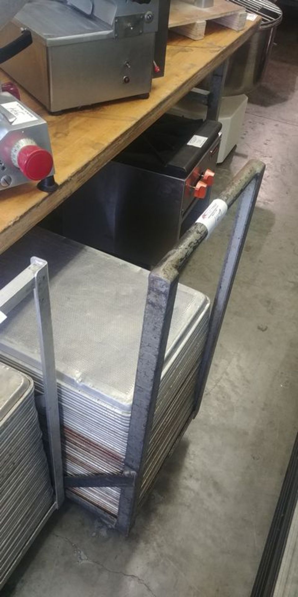 Cart with 50 Perforated Aluminum Full Size Baking Sheets