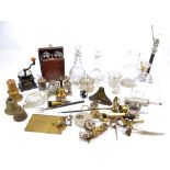 A mixed lot of varied metalware to include bells including example modelled as a light house and