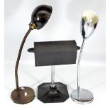 A 1940s desk lamp with rotating shade and bakelite base and two desk lamps with adjustable angled