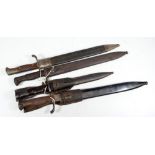 Four various bayonets in scabbards (4).