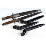 Three small socket bayonets with scabbards and two further bayonets (5).