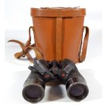 A pair of military issue binoculars inscribed 'C.G.B. 40M.