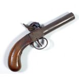 A small percussion cap muff pistol with engraved lock and walnut stock, length 18cm.