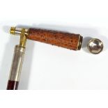 A novelty Edwardian gadget stick with telescope set to the handle,
