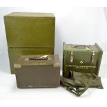 Three mid-20th century military wooden green painted equipment boxes,