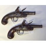 A pair of small flintlock muff pistols with screw-off cannon barrels, locks inscribed 'R.