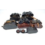 Six pairs of Russian and Polish binoculars, all cased, including a small folding pair (6).