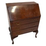 A mid-20th century walnut bureau with three drawers and cabriole legs, width 76cm.