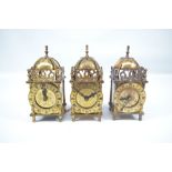 A Smiths small brass lantern clock with electrically operated movement and two further similar