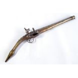 An Albanian rat tail miquelet lock pistol with typical ornate detailing throughout, length 54cm.