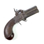 A small percussion cap over/under double barrel pistol with revolving action,