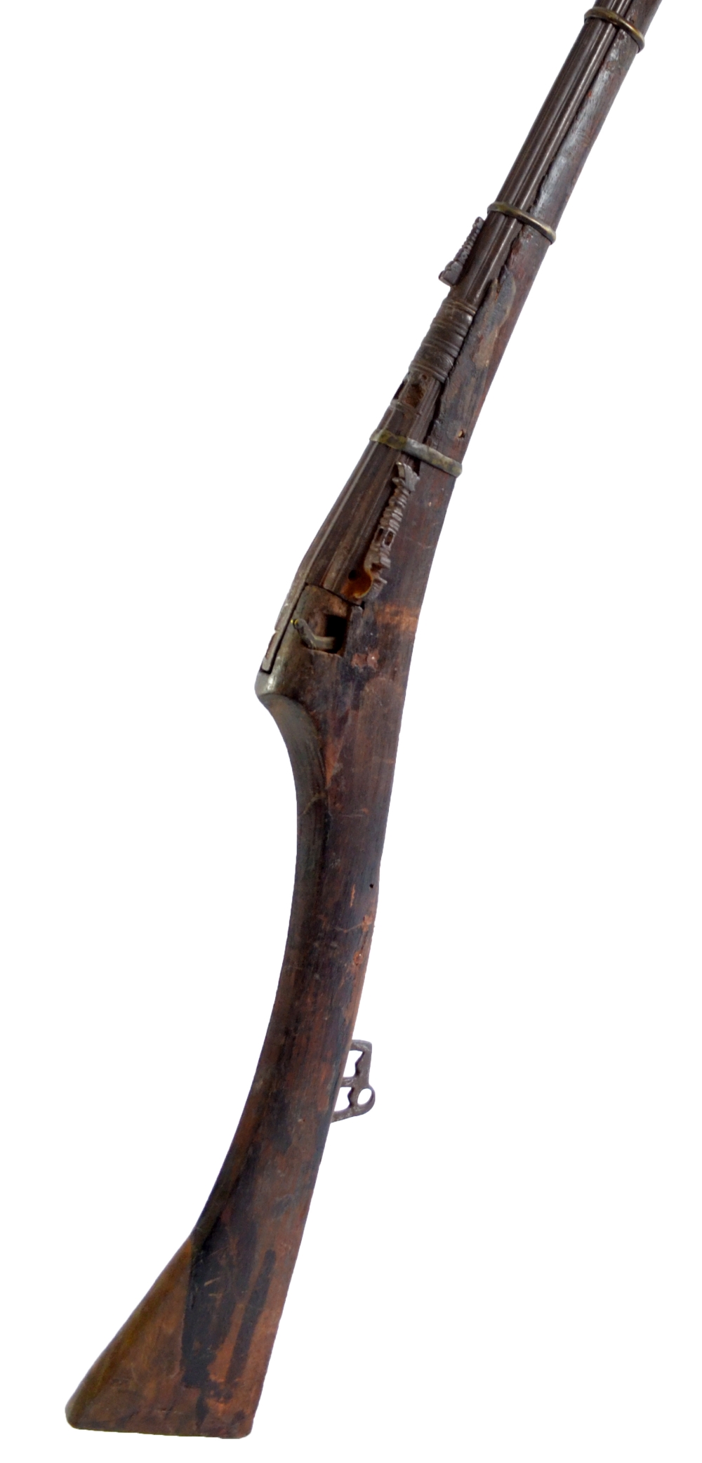 A Middle Eastern matchlock musket with part fluted barrel and brass furniture, for restoration,