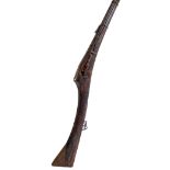 A Middle Eastern matchlock musket with part fluted barrel and brass furniture, for restoration,
