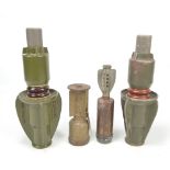 Four WWII period munitions to include British war issue drill grenade stamped with broad arrows,