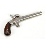 A small percussion cap pocket pistol, stamped '1285', and with walnut stock (af), length 15.5cm.