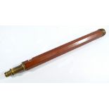 An unnamed late 18th century single-draw telescope, with octagonal walnut barrel and brass end caps,