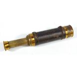 JH STEWARD, 406 STRAND, LONDON; a 1" brass three-draw telescope with stitched leather barrel,