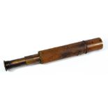 JB DANCER OF MANCHESTER; a 1.5" brass three-draw telescope, with stitched leather barrel, length 26.