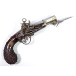 A small miquelet lock pocket flintlock pistol with octagonal steel barrel bearing stamp 'FM',