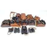 Nine various cased pairs of prismatic binoculars, including Bino Prism no.5, etc (9).