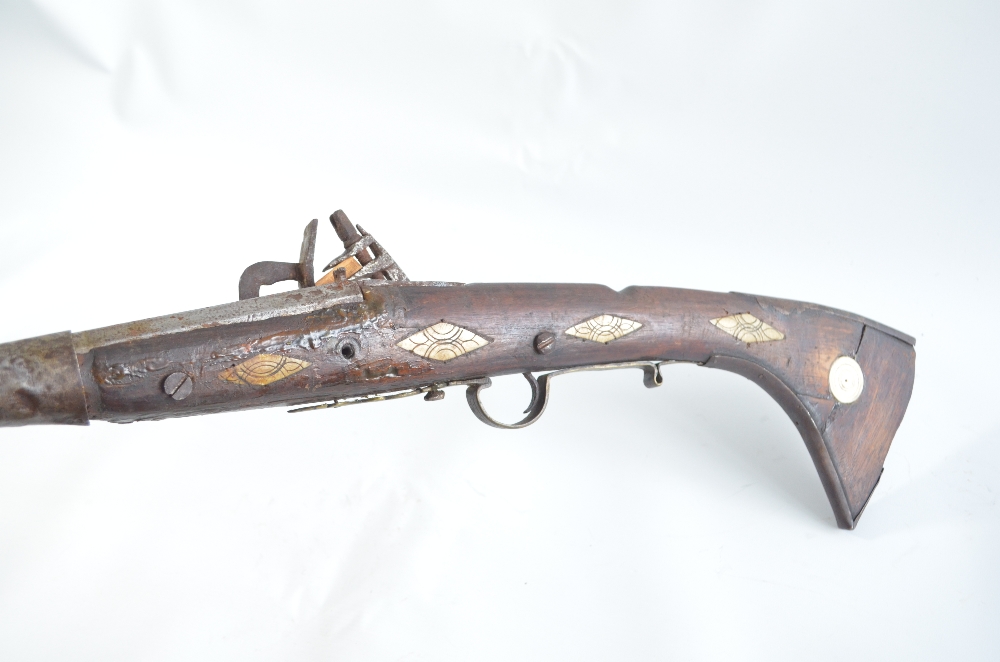 A Middle Eastern flintlock musket with bone inlaid stock (af), length 130cm. - Image 2 of 2