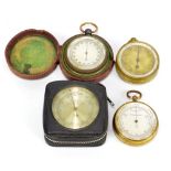 Three late 19th/early 20th century pocket barometers including a compensated example with silvered