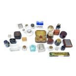 A collection of travelling inkwells and other inkwells, also two glass stamp rollers.