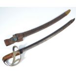 An early 20th century clip point cutlass, with walnut grip, pierced guard and curved blade,