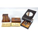 A circa 1900 figured walnut and brass strap decorated hand held stereoscope,