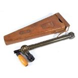 SRP; a leather cased periscope with wooden grip, stamped 'M.G. No.
