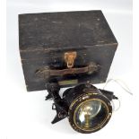 A cased Admiralty Patt. 5110.E portable signalling lantern, dated 1945 and no.267653.