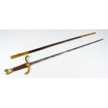 A late 19th century dress sword, with scrolling pommel,