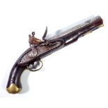 A flintlock pistol with brass furniture and bearing various proof marks to the barrel,