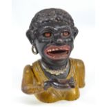 A circa 1900 cast iron 'Dinah' money bank with original paint and numbered 581285, height 17cm.