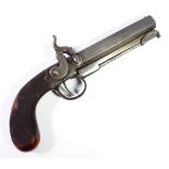 A fine percussion cap holster pistol with octagonal barrel, integral hinged ramrod, clip,