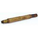 EF CRAKE OF LOWESTOFT; a 1.5" brass single-draw telescope with string effect barrel, length 53cm.