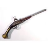 An unusual flintlock pistol with gilt heightened decoration to the steel cannon barrel,